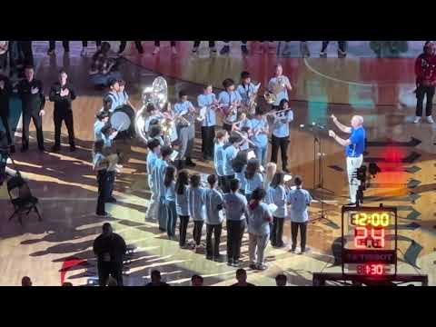 Katherine Johnson Middle School band plays Star Spangled Banner for Washington Wizards game.