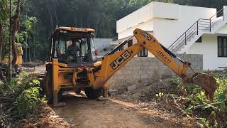 jcb 3dx climbing risky places for cleaning and land levelling