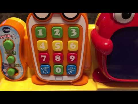 Playing with the Vtech touch and learn activity desk phone!