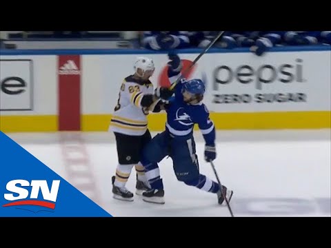 Brad Marchand Grabs Brayden Point's jersey On The Way To Bench