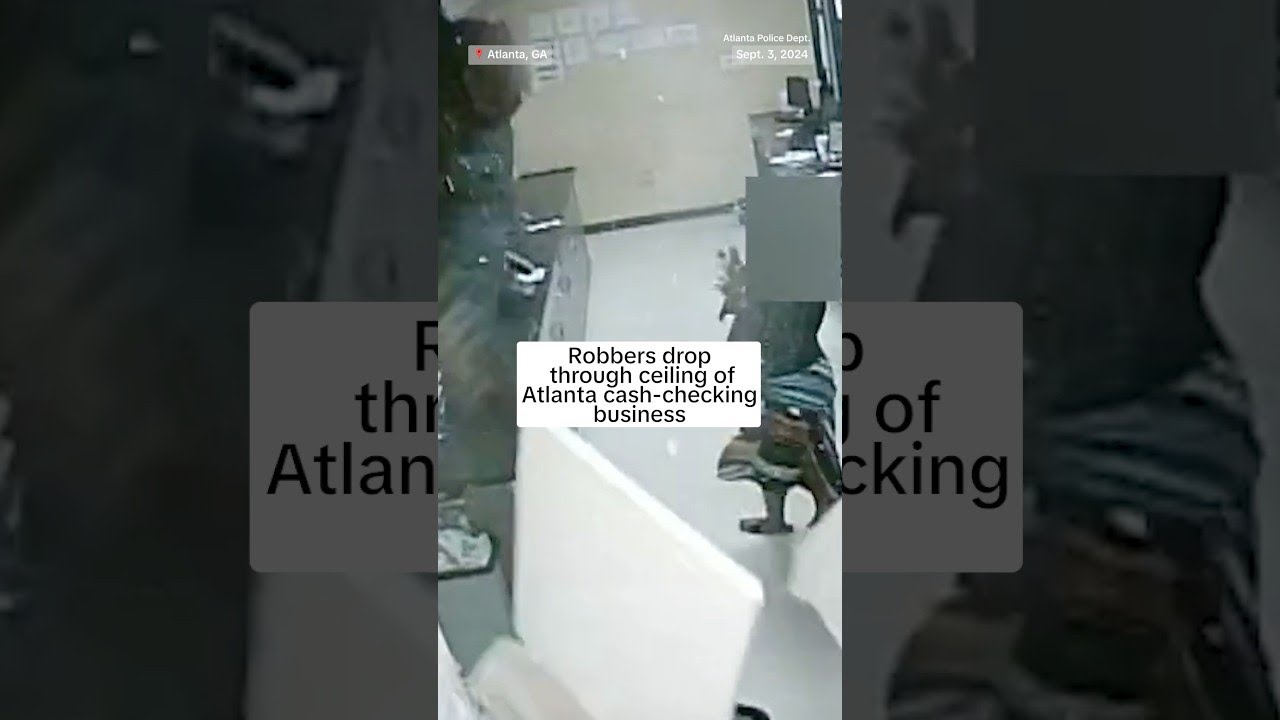 Robbers drop through ceiling of Atlanta cash-checking business Robbers drop through ceiling of Atlanta cash-checking business
