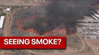 Large mulch fire burns near Mesa