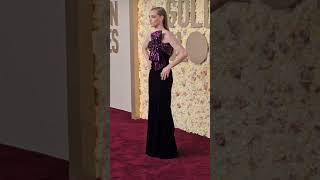 Amanda Seyfried wows as she steps onto the red carpet in black dress with a BEDAZZLED bow Profile