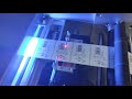 Automactic Roll encoding print and QC machine