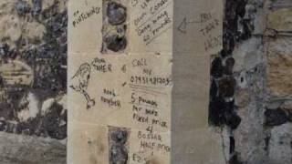 London: Muslim gangs graffiti Christian church. Stepney.