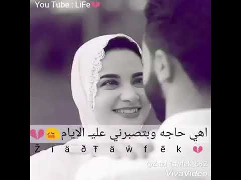 وبروح علي صورتك اخدها في حضني وانام