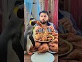 the man eats food with penguin🐧