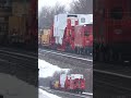 Giant Load with Red Caboose. Pulled by SpongeBob Locomotive on CSX Train.