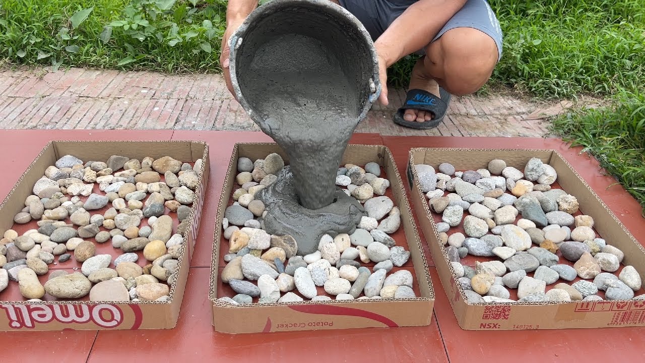 Great creativity and art when working with natural gravel and cement. Art is flower pot from gravel