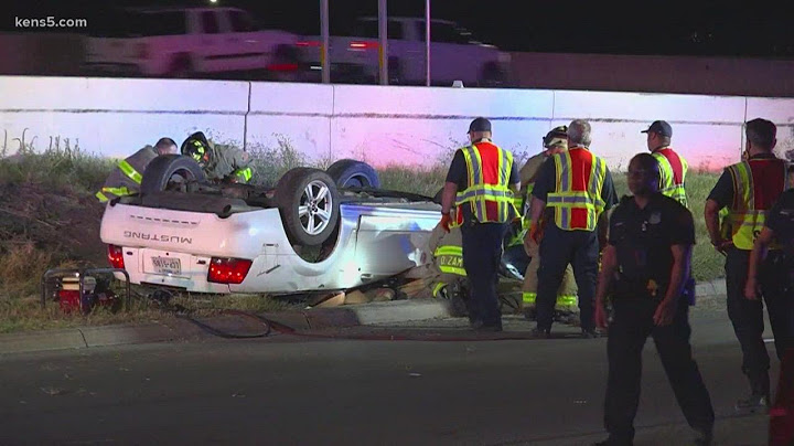 Woman dies after being crushed in rollover crash, police say