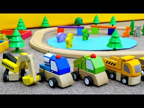 Spielzeugautos bauen einen Tierpark. Trickfilm für Kleinkinder.