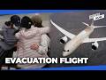 S.Koreans stranded in UAE return home on chartered flight amid escalating tensions surrounding Iran