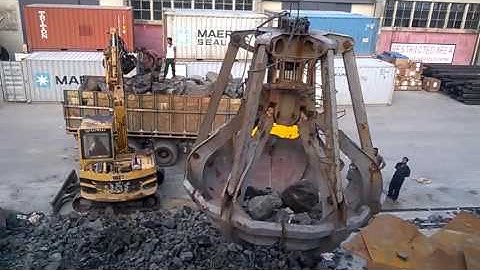 Unloading Boulder by orange peel grab at Mongla