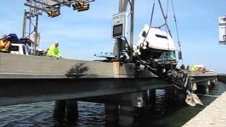Timelapse: Tractor trailer pulled from I-664 bridge