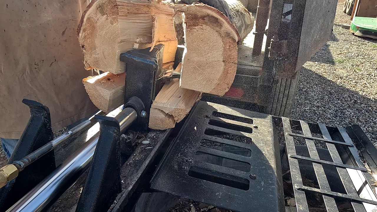 Six Dry logs Bucked, Split, and Stacked  Or Are They