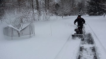 Modified Snowblower with impeller pads prevent the chute from clogging and throws snow twice as far