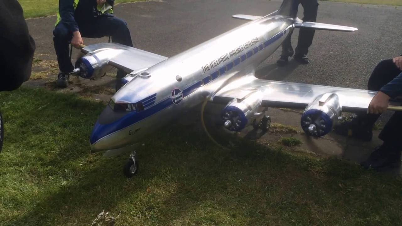 Four O.S. GT 33  engines singing in  DC 4 Globemaster