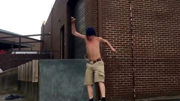 Kick flip off a loading dock
