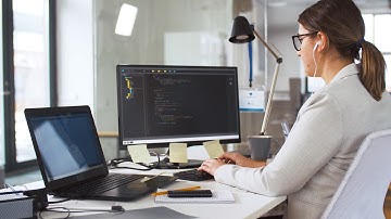 Computer Programmer working with Earphones, Stock Footage