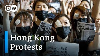 Hong Kong protesters 'sorry' to travelers, but plan more demonstrations | DW News
