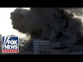 Dozens killed as Israel, Hamas trade rocket fire
