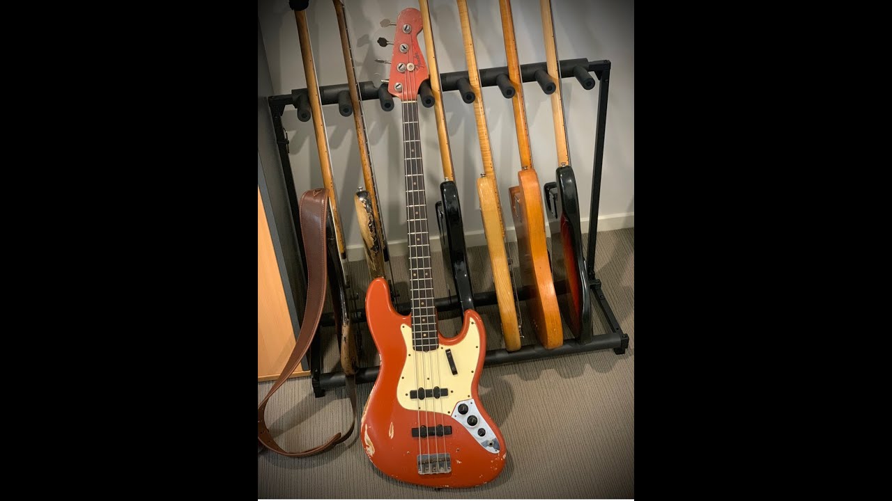 1964 FENDER JAZZ BASS IN FIESTA RED - Andy's Vintage Guitars