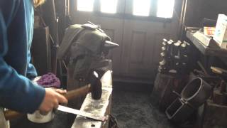 Forge welding a strap hinge