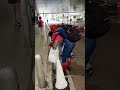 Spider-Man picking up trash