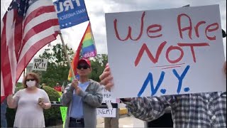 ReOpenNC protesters march in downtown Raleigh