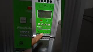 voltage regulator from the wind turbine and solar panels to the battery