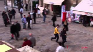 Valletta reverse-pickpocketing caught on tape.