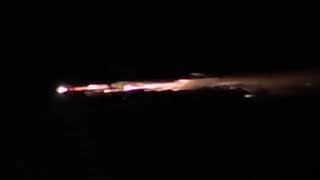 Fiery Glowing Object Breaks Apart As It Falls From Night Sky