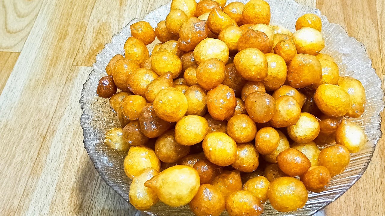 اذا عندك كوبين الطحين ملعقتين نشا تعالي نعمل اطيب عوامه او لقمه القاضي باسهل طريقه لذيذه ومقرمشه