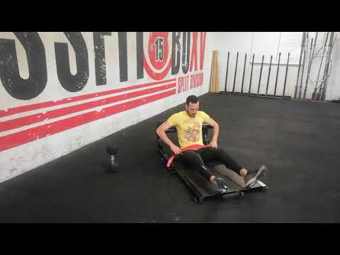 Hip thrust isometric hold with band and dumbell