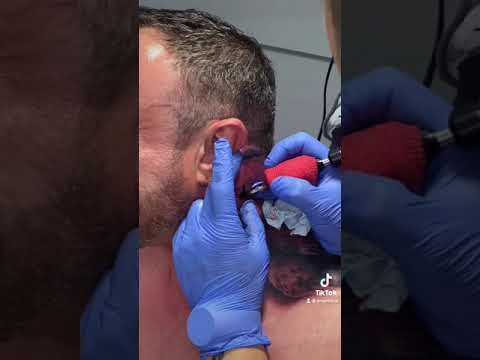 Wideo: Jak uzyskać tatuaż za uchem (ze zdjęciami)