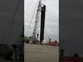 Oil well service rig 32 running in the hole