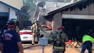 Car ruptures gas line sparking gas fire in Fresno California
