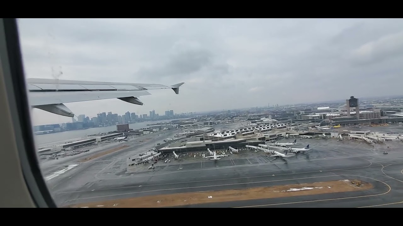 Clip: Plane taking off over the Boston Skyline Boston Massachusetts