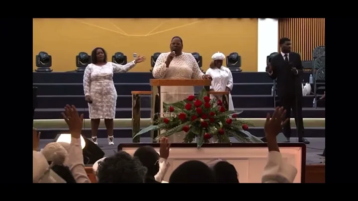 J. Denise Ray praying at Mother Gertrude Stacks Fu...