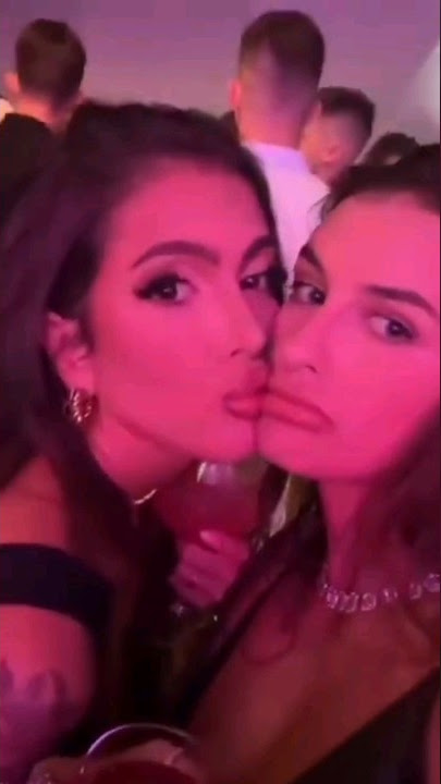 2 hot girls tongue kissing in party