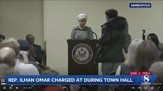 Man tackled to ground after spraying unknown substance on Rep. Ilhan Omar at town hall in Minneap...