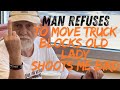 Man shoots me bird and blocks elderly lady's car ! She can't open door to get in and back out.
