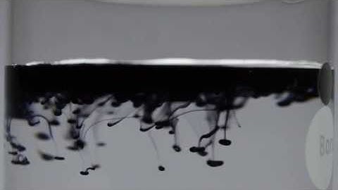 Double diffusive convection (hot dyed water over cold water)