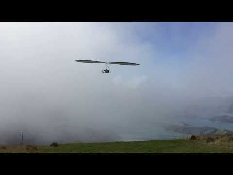 Hang gliding, strong wind and clouds, take off, Christchurch - Allandale, New Zealand
