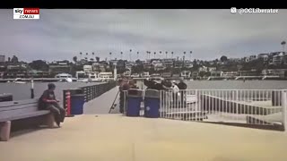 Shocking moment boat full of suspected illegal migrants docks in California Resimi