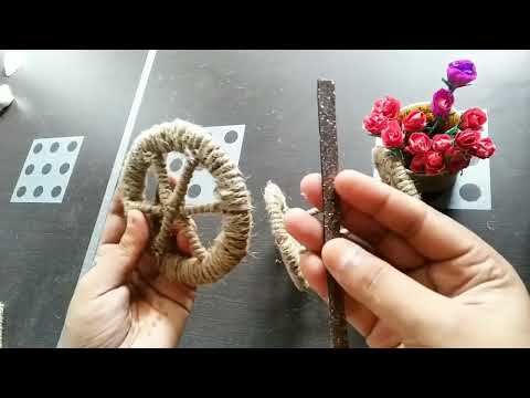 making beautiful mini bike with rope and cardboard with crepe paper Rose