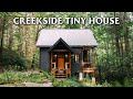 Peaceful creekside tiny house next to waterfall full tour