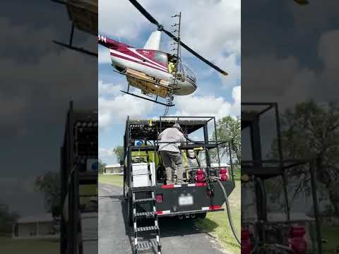 Pilot Lands His Helicopter Neatly Over Truck