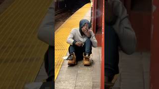 Drug addict smoking weed on subway station, where Empire State Building is located #newyork