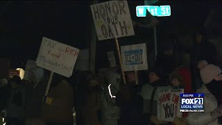 Protesters gather outside Pete Stauber’s Duluth meeting